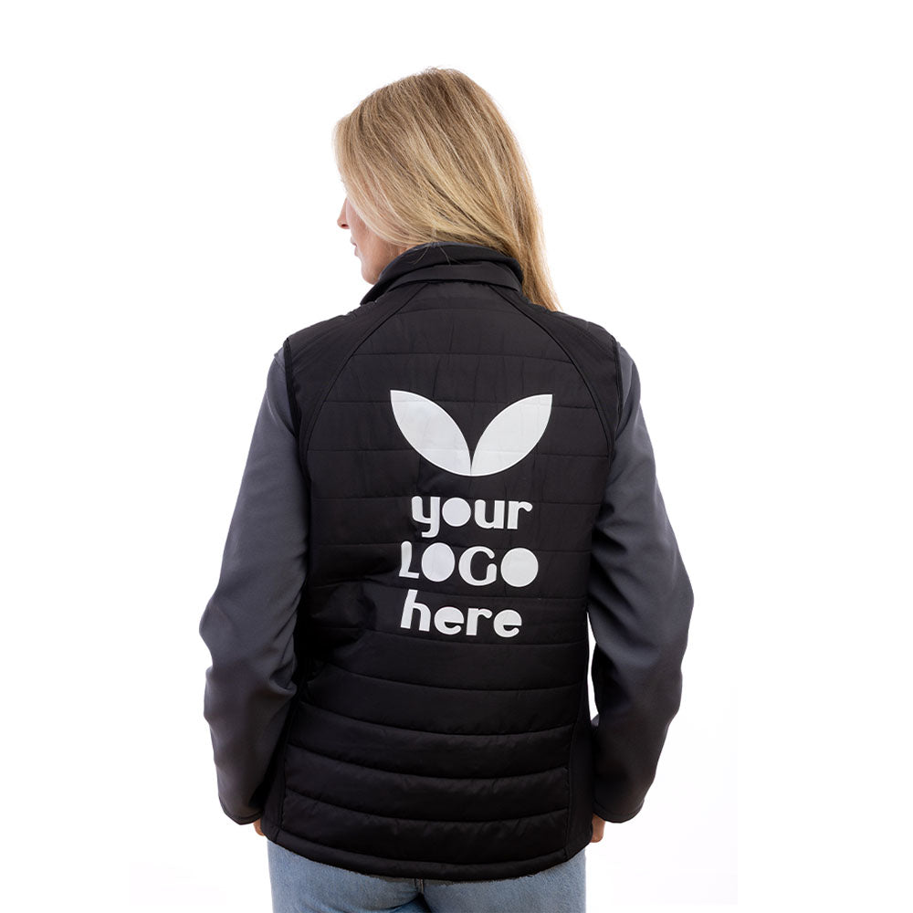 A woman in a black Expo Padded Gilet from behind.