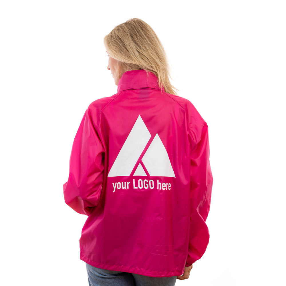 A woman wearing a hot pink EXPO rain jacket from behind.