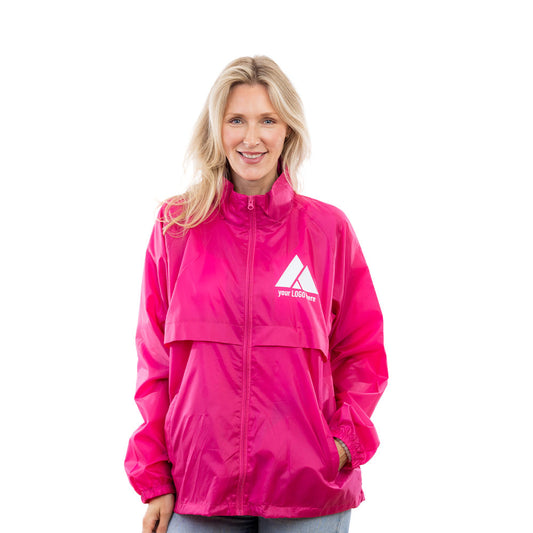 A woman wearing a hot pink Expo Rain Jacket.