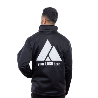 A man wearing a black EXPO softshell jacket from behind.