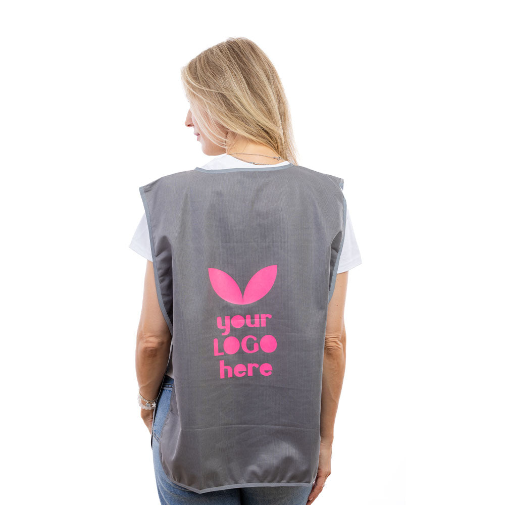 A woman in a Grey Halo Tabard from behind.